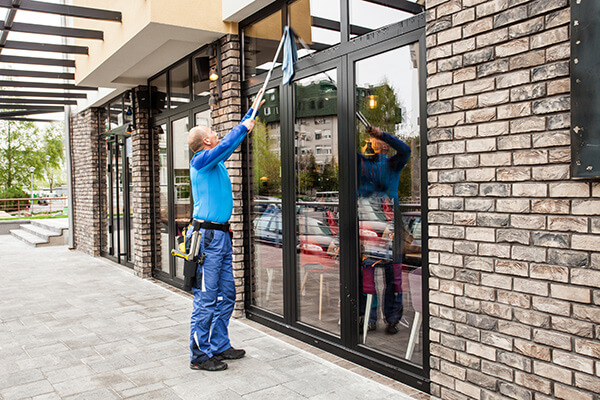 professional cleaning window of residential property